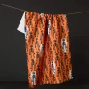 GEOMETRY Resting Skeletons Orange Tea Towel